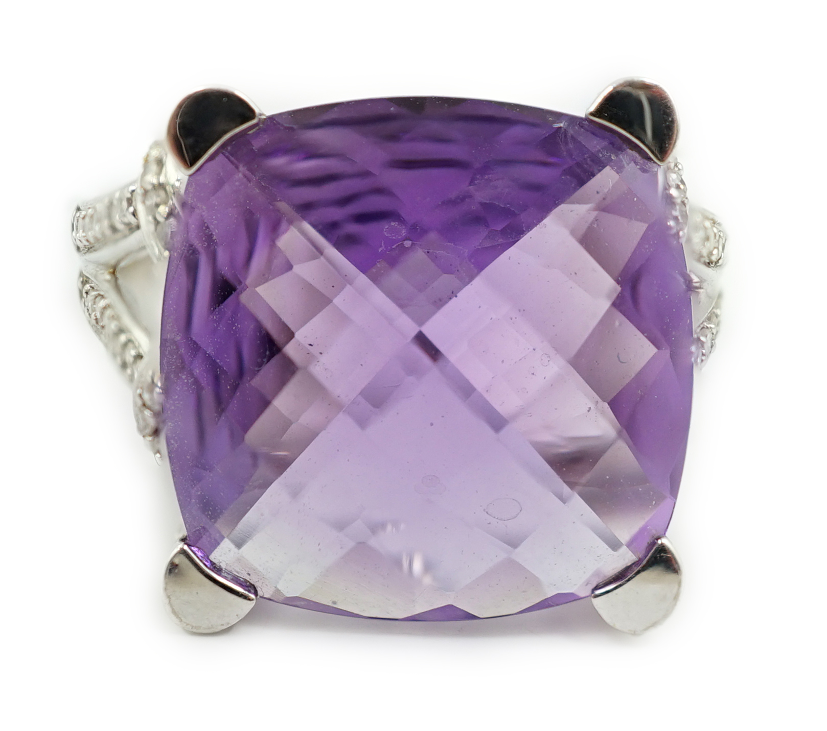 A modern 14k white gold and single stone fancy cushion cut amethyst dress ring